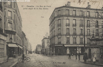 31. Pantin - La rue de Paris prise angle de la rue Hoche (Crédit lyonnais, tramway, vespasienne).