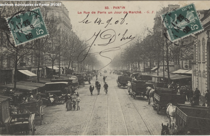 83. Pantin - La rue de Paris un jour de marché.