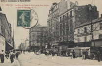 7. Pantin - La rue de Paris au coin de la rue Hoche, un jour de marché.