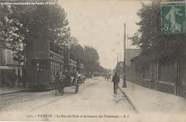 1411. Pantin - La rue de Paris et la station de tramways.