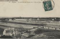 53. Pantin - Vue générale des écuries et de la ville de Paris.