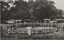 École maternelle de Plein air - Bain de soleil sur la plage.