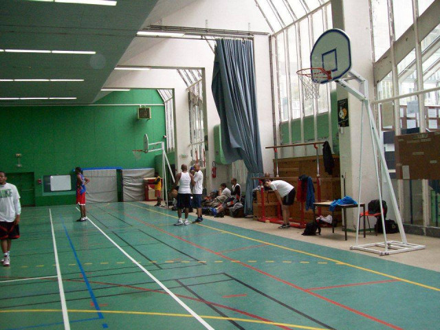 Basket-ball. - Entraînement au gymnase Henri-Wallon : photographie des joueurs.